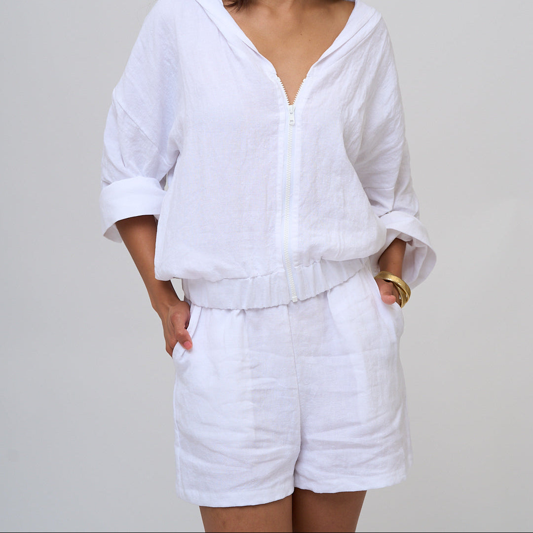 White linen shorts with elastic waist band and pockets. Set comes with tank (not pictured). 