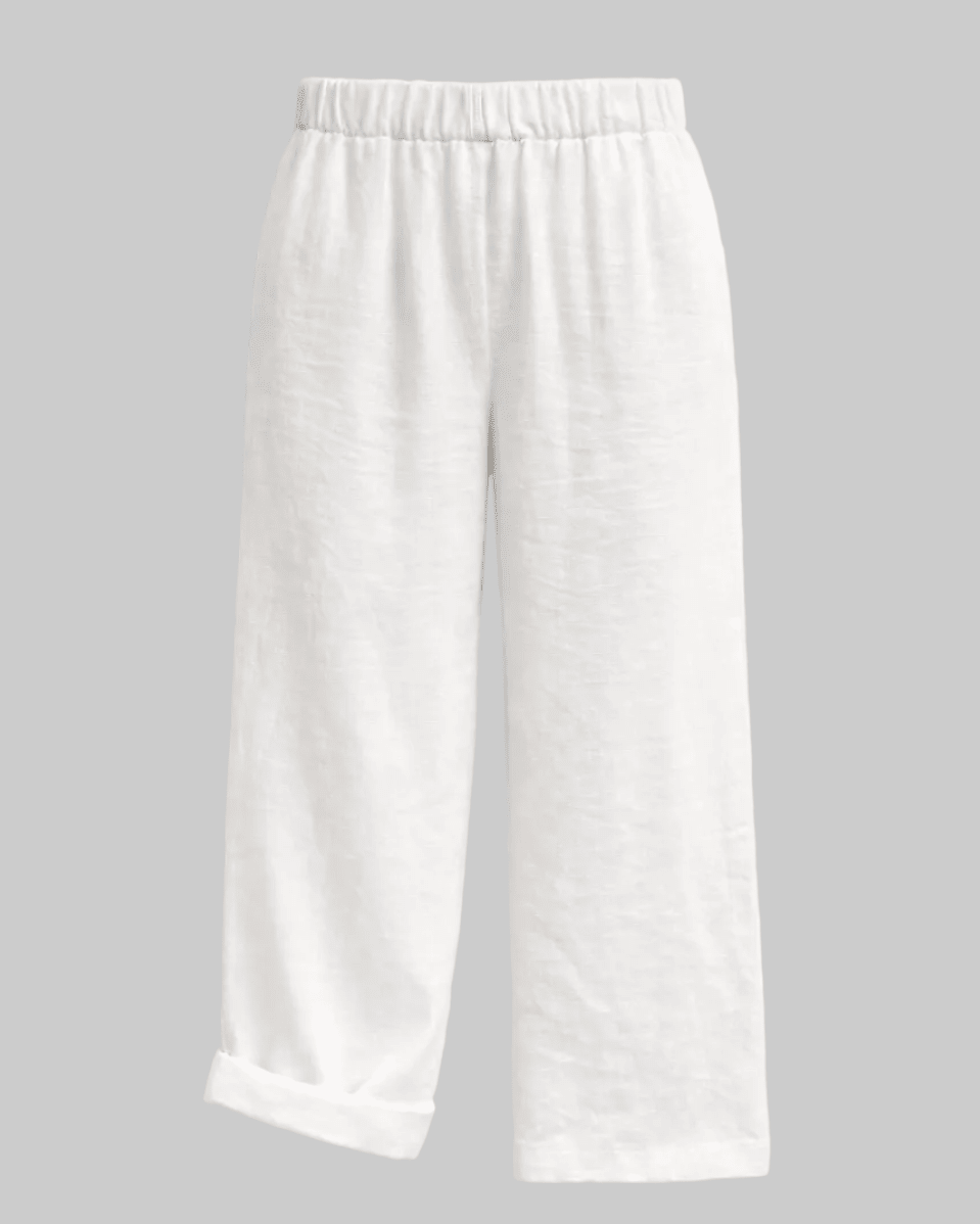 High waist, wide leg white linen pant with pockets and elastic waist band and adjustable hem for joggers with snaps
