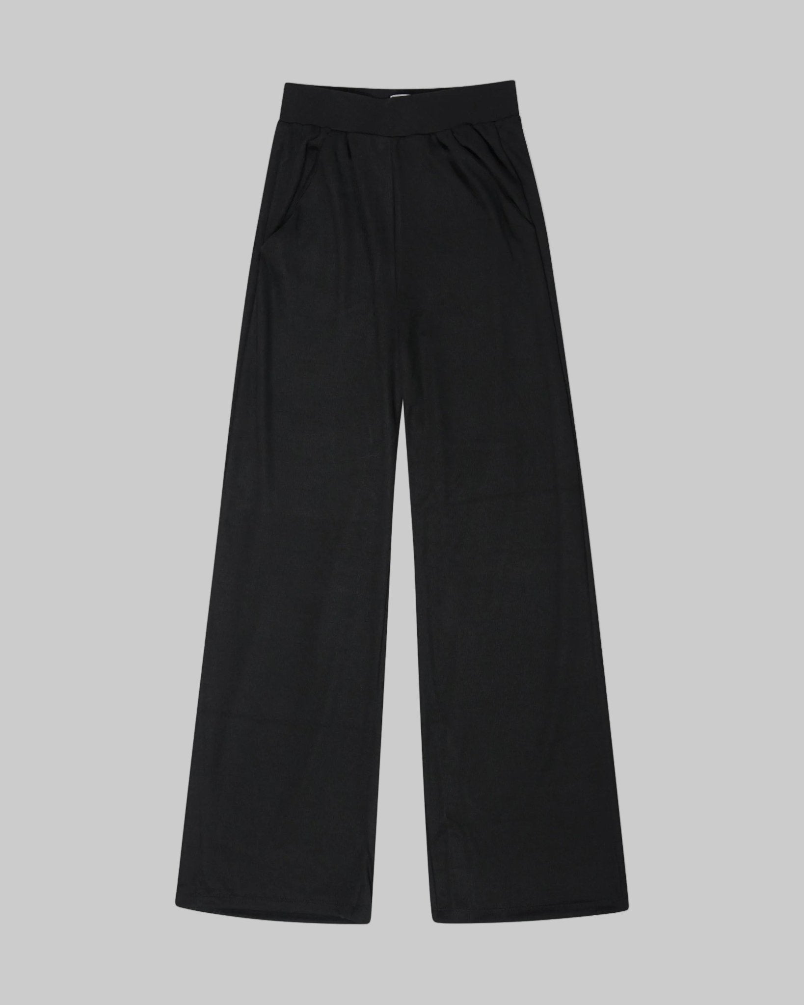 Luxurious Bamboo knit set. Dolman sleeve v-neck top, high waist, wide leg knit pant with elastic waist band and pockets. Relaxed fit. Pants only shown. Black. 