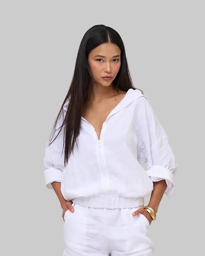 Oversized white linen shift zip hoodie, cropped elastic waist and adjustable sleeves with snaps