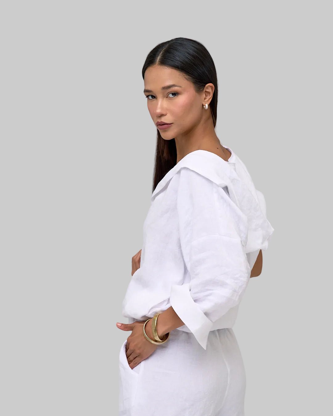 Oversized white linen shift zip hoodie, cropped elastic waist and adjustable sleeves with snaps