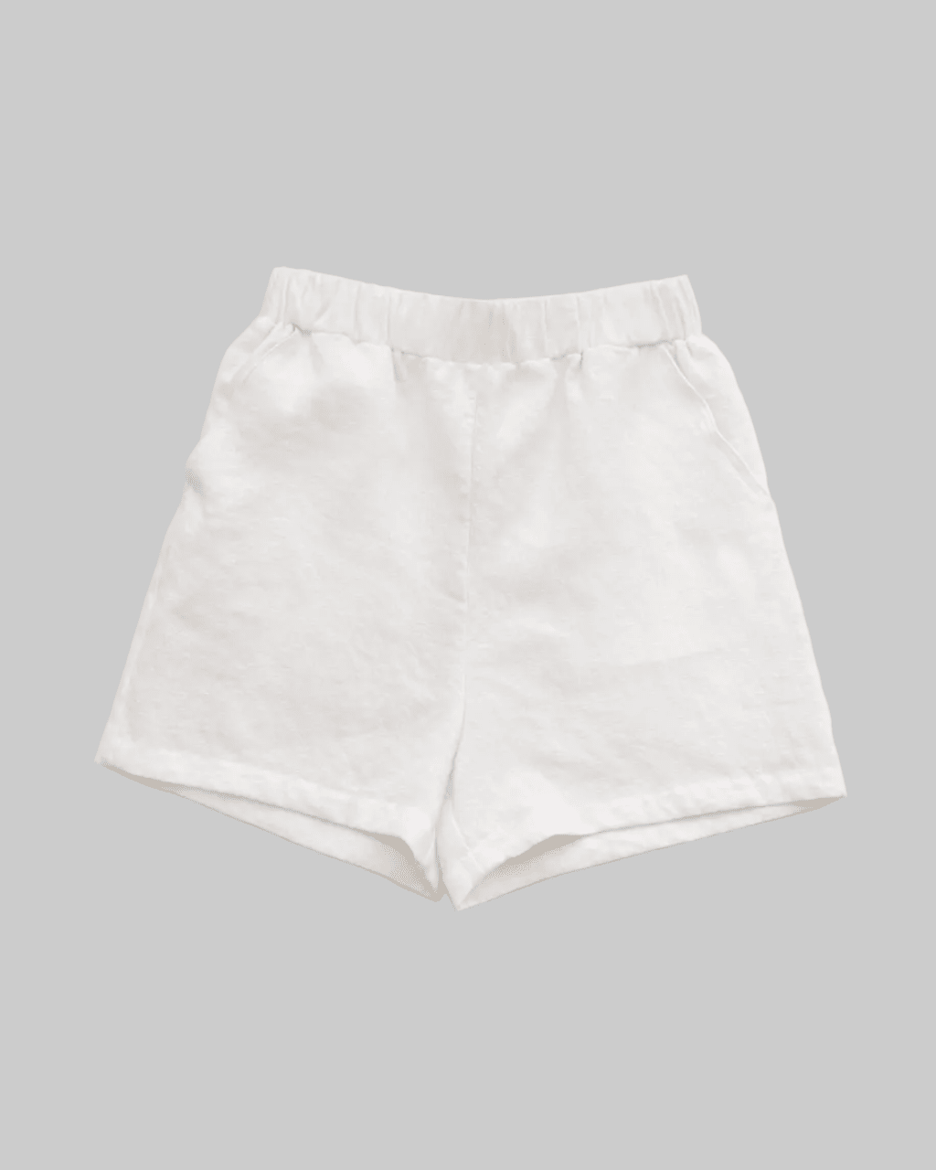 Relaxed fit White linen short with pockets, elastic waist 

